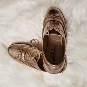 Rose gold lace up shoes